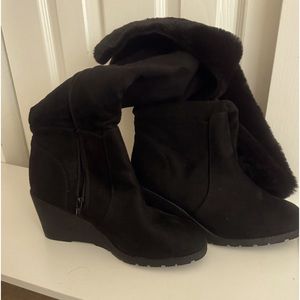 Size 9W. Knee high wedge boots.  Never worn.  Fake fur on the top of the boots.